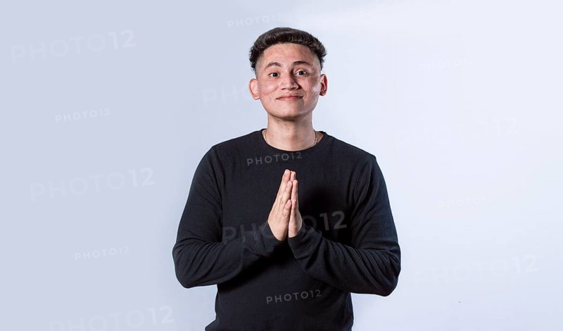Man asking please isolated. guy putting hands together asking please isolated