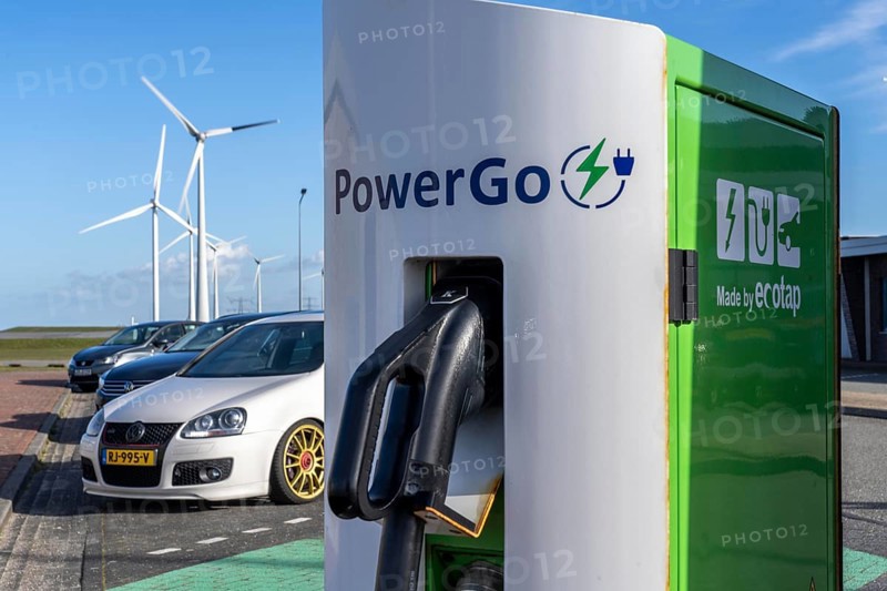 Electric car fast charging station, from the Dutch provider PowerGo, in the ferry harbour of Eemshaven, powered by renewable energy, Netherlands