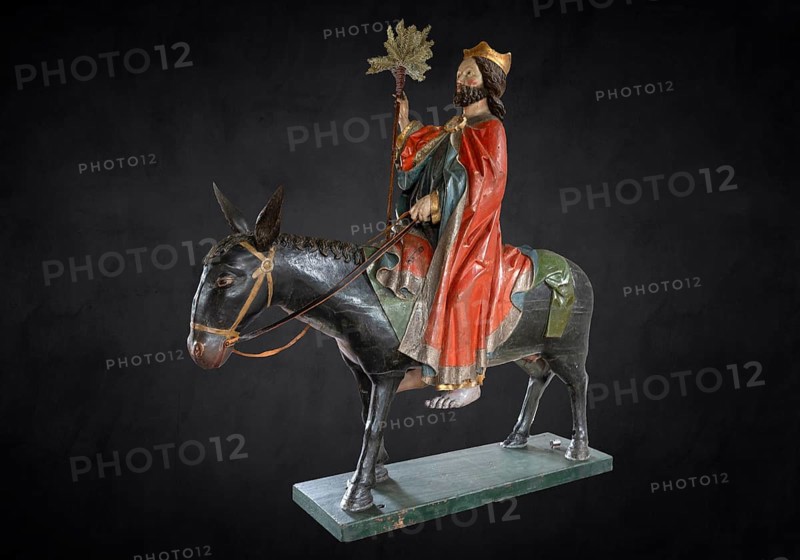 Christ on the palm donkey on a dark background, wooden figure from around 1470, Church of St Jodokus, Bad Oberdorf, Oberallgäu, Bavaria, Germany, Europe