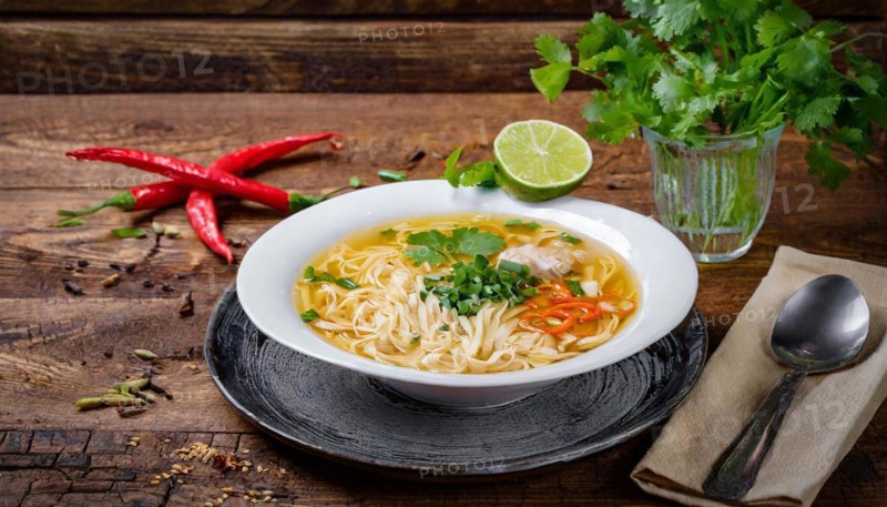 Food, a plate of chicken soup with ramen, Japanese noodles on a wooden table, AI generated, AI generated