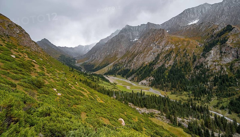 Green mountain valley with river and steep mountain peaks, Chong Kyzyl Suu Valley, Terskey Ala Too, Tien-Shan Mountains, Kyrgyzstan, Asia