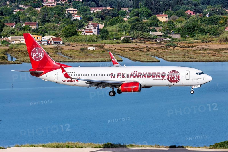 A Boeing 737-800 aircraft of Corendon Airlines with the registration 9H-CXA and the 1 FC Nuremberg special livery at Corfu Airport, Greece, Europe