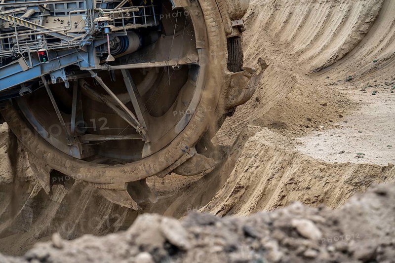 Opencast lignite mine Garzweiler 2, bucket wheel excavator 261 excavating the surface, at the rest of the hamlet Lützerath, bucket diameter is 17 metres, Erkelenz, North Rhine-Westphalia, Germany, Europe
