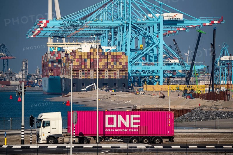 The seaport of Rotterdam, Netherlands, deep-sea harbour Maasvlakte 2, on an artificial land area off the original coast, APM Container Terminal, in front the MSC MELATILDE, behind it the MAASTRICHT MAERSK container ship, being loaded/unloaded, Rotterdam, Netherlands