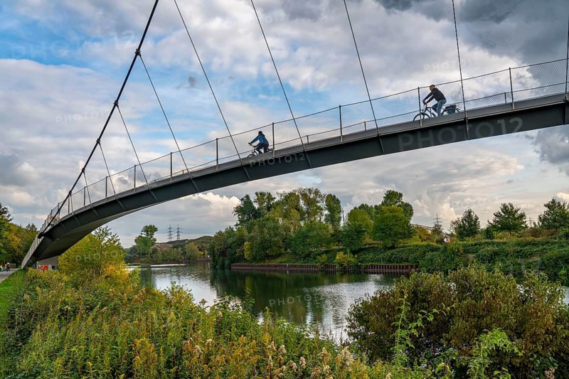 Bridge over the Rhine-Herne Canal near Gelsenkirchen Cycle and footpath, part of the ore railway line between Bochum and Gelsenkirchen, Zoom Bridge or Grimberger Sichel Bridge, Gelsenkirchen, North Rhine-Westphalia, Germany, Europe