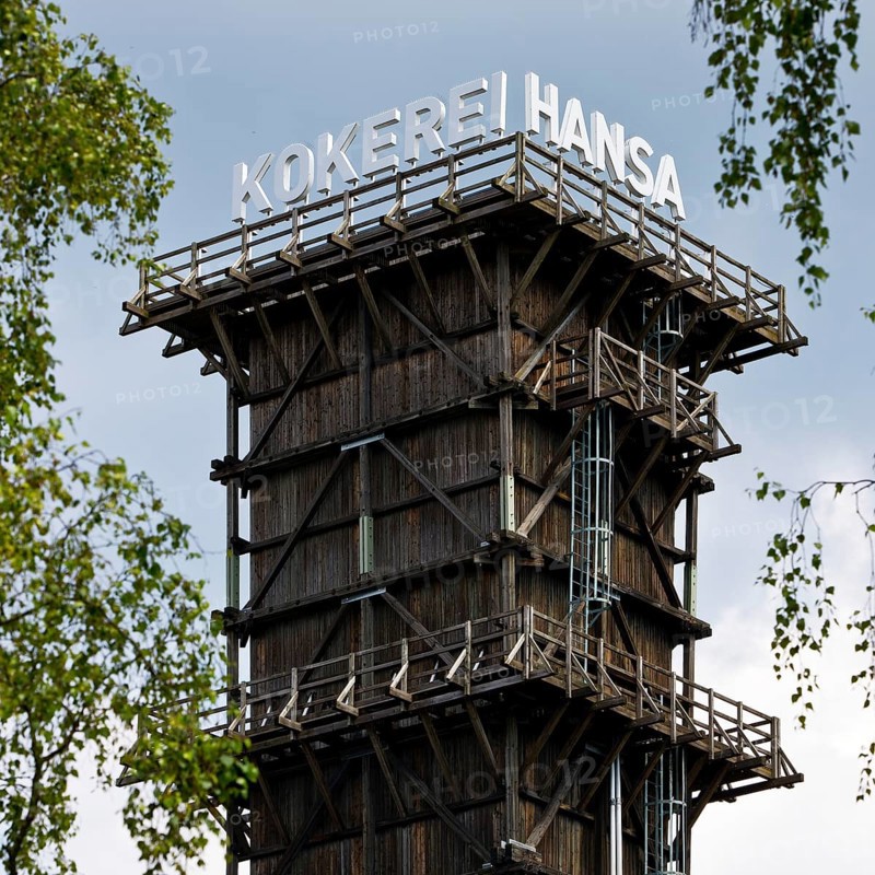 The extinguishing tower with the lettering of the Hansa coking plant, landmark in Dortmund-Huckarde, Ruhr area, North Rhine-Westphalia, Germany, Europe