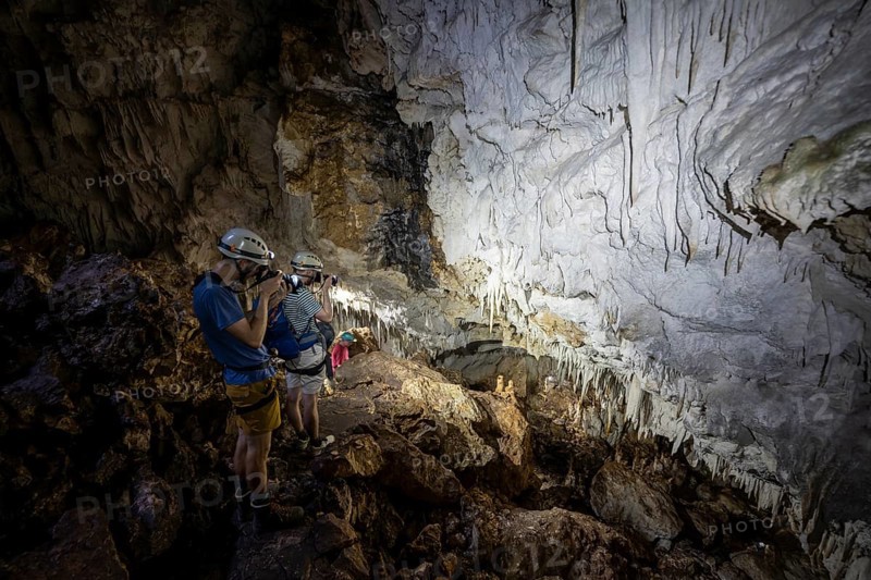 Tourists in a stalactite cave, Terciopelo Cave, Barra Honda National Park, Costa Rica, Central America
