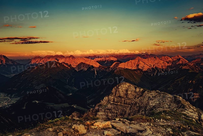 Thaneller summit at sunset in the Lechtal valley in Tyrol with a wonderful view of the surrounding mountains. Tyrol, Austria, Europe