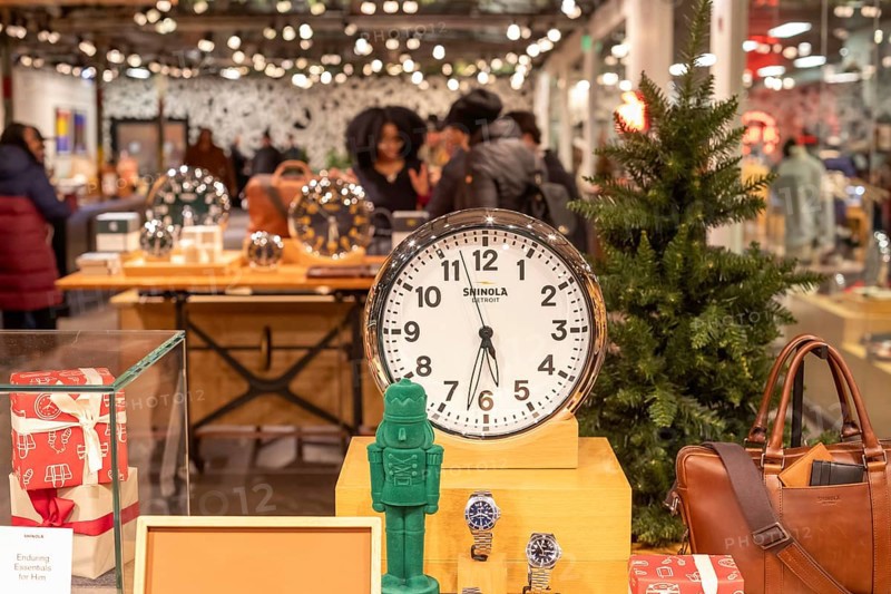 Detroit, Michigan - People shop for luxury watches and other items at the Shinola Detroit store on Noel Night. The annual Noel Night at the start of the holiday season in Detroit features open houses by arts and cultural institutions, churches, and small businesses.