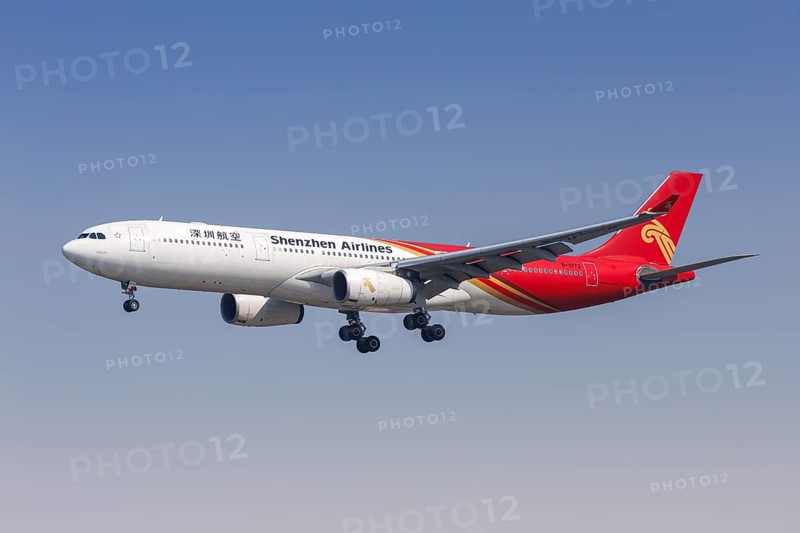 An Airbus A330-300 aircraft of Shenzhen Airlines with the registration number B-1072 at Hongqiao Airport (SHA) in Shanghai, China, Asia