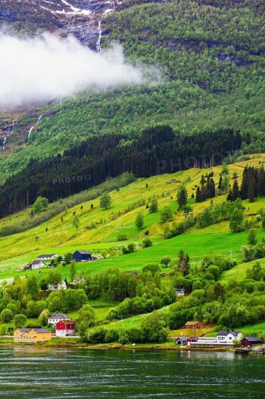 Mountains and Fjord over Norwegian Village, Olden, Innvikfjorden, Norway, Europe