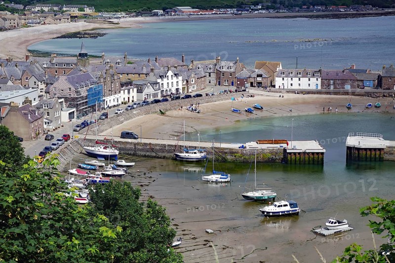 Coastal village with beach, boats and houses surrounded by hills, Stonehaven, Aberdeenshire, Scotland, United Kingdom, Europe