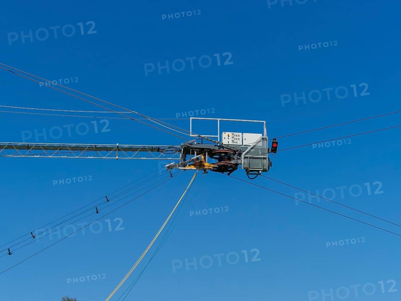 Wakeboard system with motor and ropes, technology for water sports, red signal