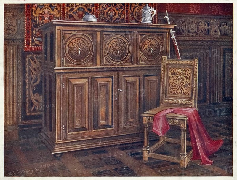 Furniture around the turn of the century 1900, Oak cabinet, with circular convex panels, Walnut chair (chaise sans bras), with interlaced floral ornament on the back (1910, 1911) .jpg