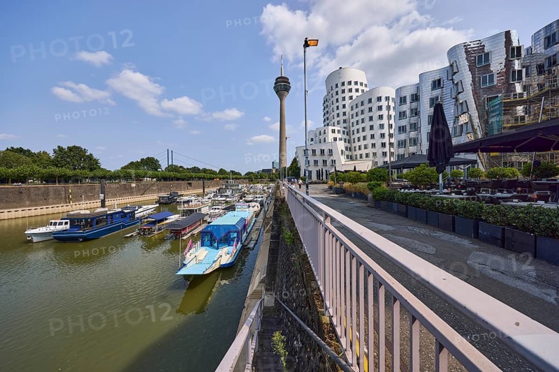 Marina, Rheinturm television tower and building by architect Frank O. Gehry in Düsseldorf, state capital, independent city, North Rhine-Westphalia, Germany, Europe