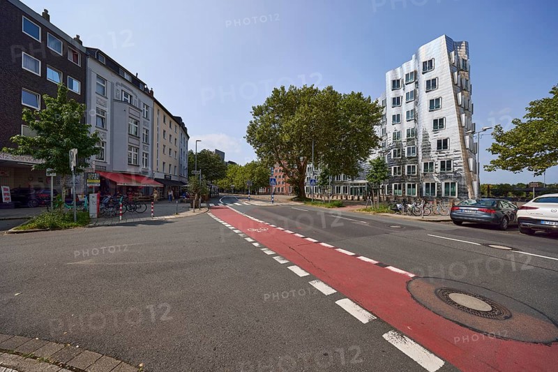 Neuer Zollhof street with residential buildings and Gehry buildings by architect Frank O. Gehry in Düsseldorf, state capital, independent city, North Rhine-Westphalia, Germany, Europe