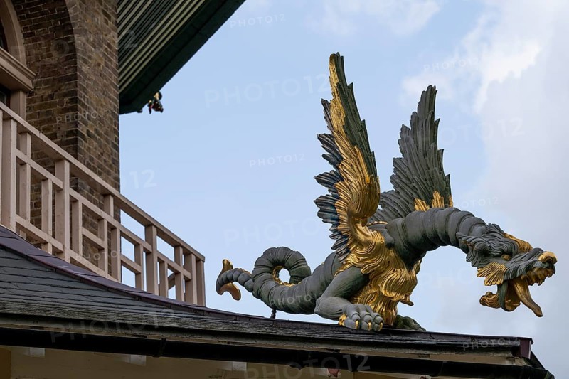 Close-up of a gold-blue-red painted dragon statue, historic large pagoda, Royal Botanic Gardens (Kew Gardens), UNESCO World Heritage Site, Kew, Greater London, England, Great Britain