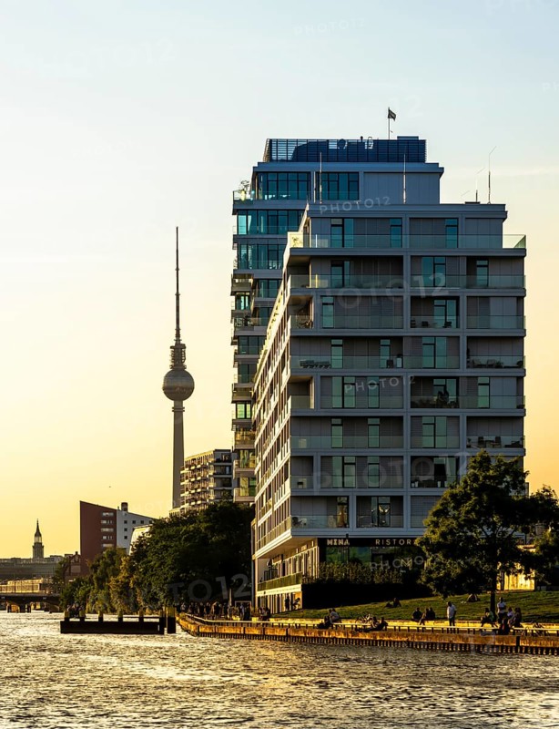 View from the Spree to an apartment building at the East Side Galery and the TV tower on the horizon, Mühlenstraße, Berlin, Germany, Europe