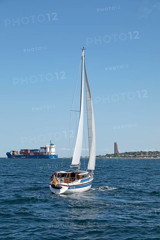 Container ship, sailing boat, naval memorial, Laboe, Schleswig-Holstein, Germany, Europe