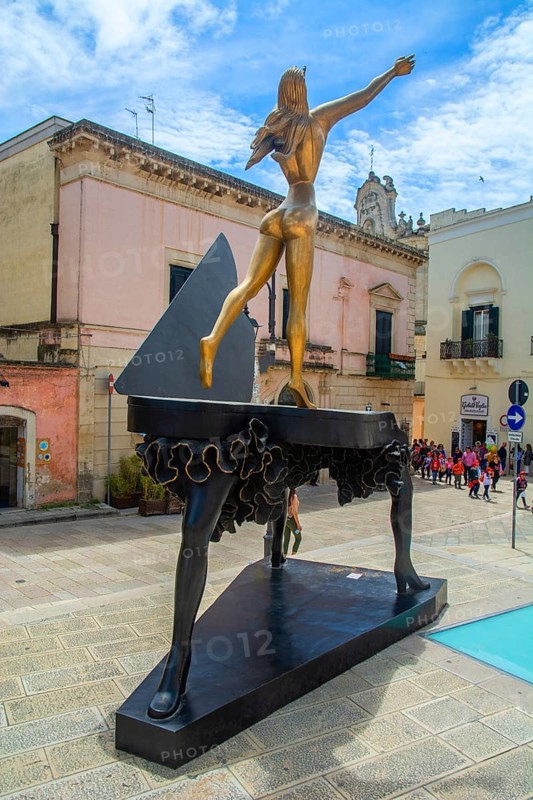 Salvador Dali sculpture Surrealist Piano in the front of Church of San Francesco dAssisi in the historic city centre of Matera, Matera, capital in Basilicata, Southern Italy, Italy, Europe