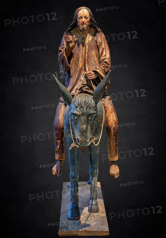 Palm tree donkey, wooden figure from around 1520, on a dark background, Diocesan Museum, Rottenburg, Baden-Württemberg, Germany, Europe
