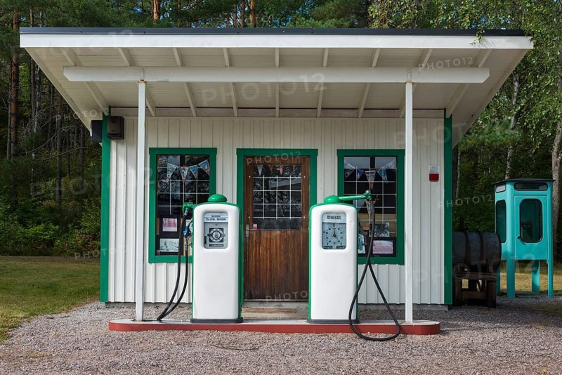 Old historic petrol station with pumps, petrol, oil, combustion, fossil, energy, fuel, environment, climate, climate change, energy transition, crude oil, Co2, car, mobile, mobility, car, drive, diesel, particulate matter, pollutant, historical, history, petrol pump, global warming, fuel, fuel price, Sweden, Europe