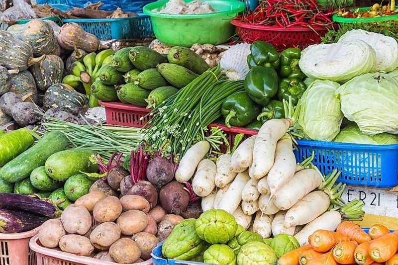 Various fresh fruits and vegetables on the market in Vietnam