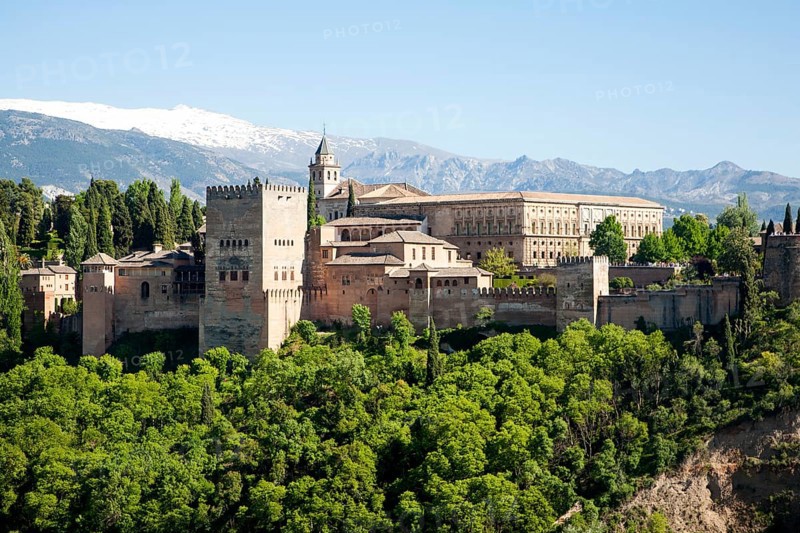 Snow capped peaks of the Sierra Nevada mountains and the Alhambra, Granada, Spain, Europe