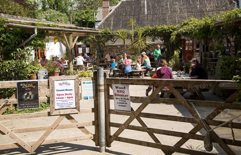 People eating ice cream at Roskilly's farm, near St Keverne, Lizard Peninsula, Cornwall, England, UK