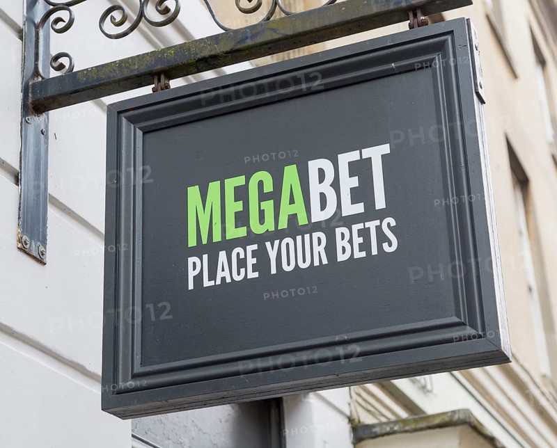 Close up of wall mounted Megabet betting shop sign, 'Place your Bets', Devizes, Wiltshire, England, UK