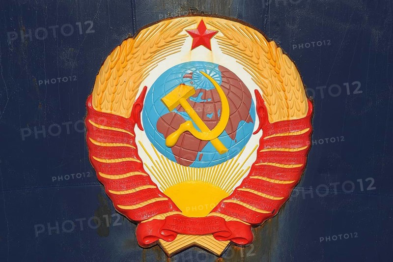 Soviet emblem featuring hammer and sickle over a globe, surrounded by wheat and topped with a red star, Crest on bow of Russian Icebreaker Kapitan Khlebnikov, Snow hill island, Weddel Sea, Antarctic Peninsula, Antarctica