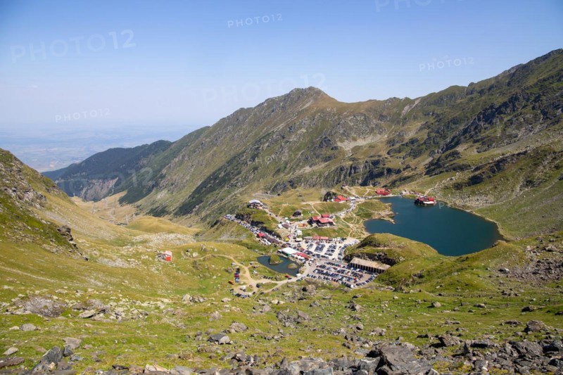 Romania: Lake Balea (Romanian: Balea Lac) from above. The lake is located at the summit of the Transfogarasch High Road in the Fogarasch Mountains on the border between Transylvania and Wallachia and is a popular excursion destination