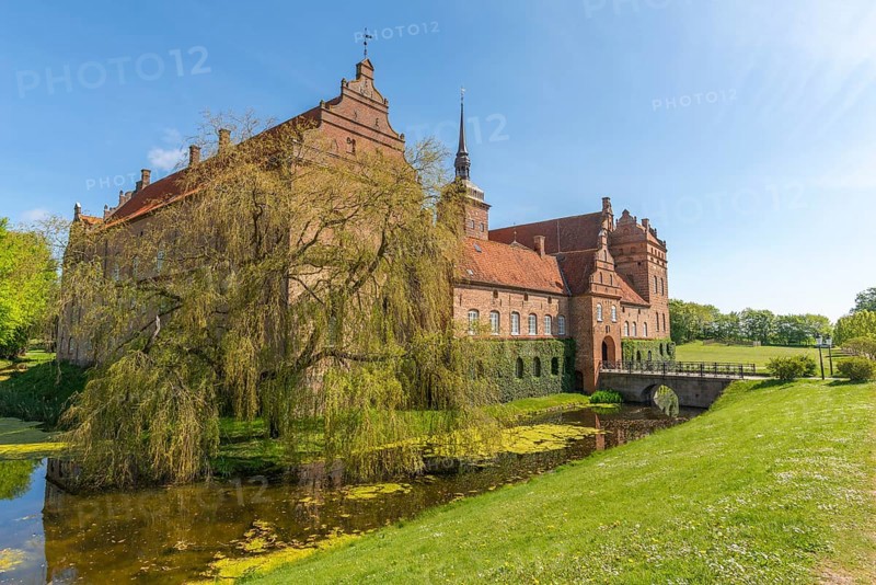 Holckenhavn Castle, hotel, brick building, castle church, castle moat, bridge, entrance gate, park, spring, Nyborg, Fyn, Fyn Island, Denmark, Europe