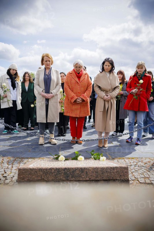 Visit to the Sachsenhausen Concentration Camp Memorial on the occasion of the programme 'Äô Youth Remembers 'Äô. (L-R) : Lisa Paus (Alliance 90/The Greens), Federal Minister for Family Affairs, Senior Citizens, Women and Youth, Claudia Roth (Alliance 90/The Greens), Minister of State for Culture and the Media, Annalena Bärbock (Alliance 90/The Greens), Federal Foreign Minister, lay flowers at a memorial stone. Oranienburg, 23.04.2024. Photographed on behalf of the Federal Foreign Office