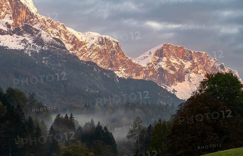 Mountain peak of the Untersberg at sunrise, mountain landscape with snow in autumn, Untersberg, Berchtesgaden Alps, Berchtesgaden, Berchtesgadener Land, Upper Bavaria, Bavaria, Germany, Europe