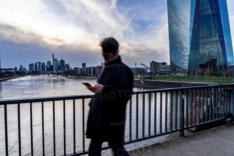 Skyline of Frankfurt am Main, skyscrapers, pedestrians on the Deutschherrnbrücke, ECB building, Hesse, Germany, Europe