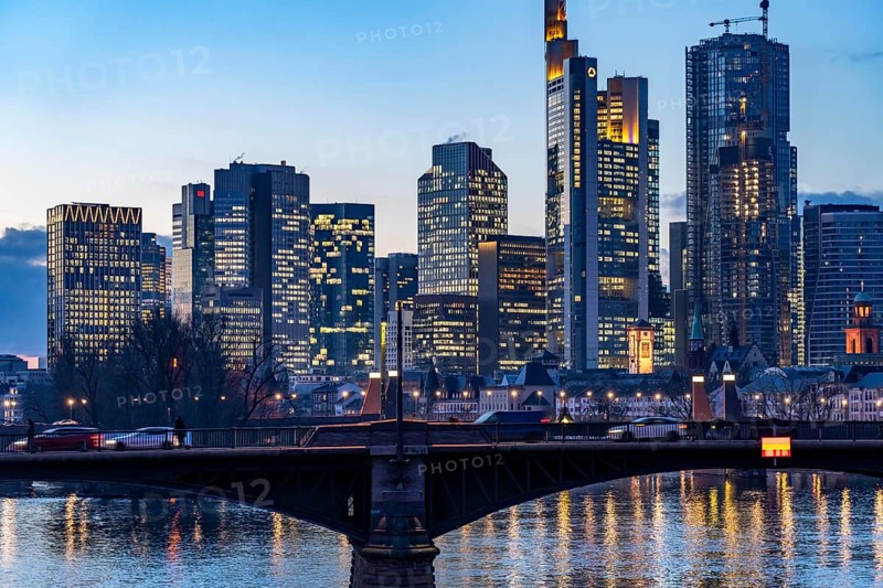 Skyline of the city centre of Frankfurt am Main, river Main, dusk, Ignatz-Bubis-Brücke, Hesse, Germany, Europe