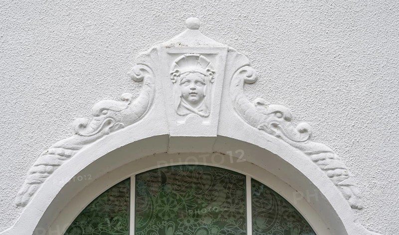 Relief of a girl's head above the fenaster of the oldest kindergarten in Lauf, 1850, Alter Schulhof 1, Lauf an der Pegnitz, Middle Franconia, Bavaria, Germany, Europe