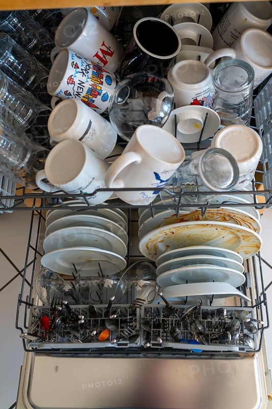 Dishwasher, full of dirty crockery