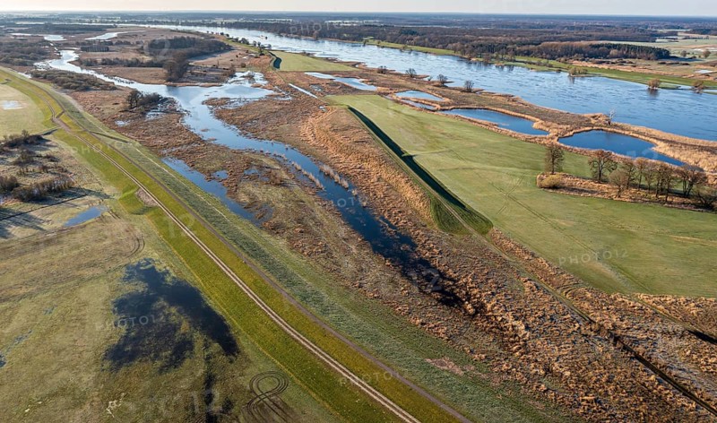 Aerial view of new dyke construction further inlands than the old dyke, flood protection, river Elbe near village Lenzen, dyke is part of Elbe cycle route, Germany, Europe