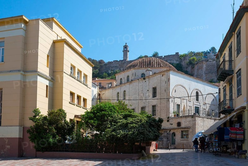 View of historic building with dome and fortress in the background under a clear sky, Agha Pasha Mosque, Nafplio, Nafplio, Nafplion, Argolis, Peloponnese, Greece, Europe