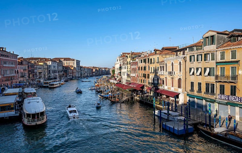 View of the Grand Canal with water taxis and vaporetto in the evening light, view from the Rialto Bridge, Venice, Veneto, Italy, Europe