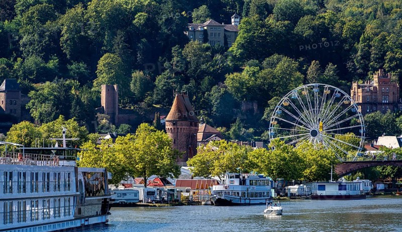 View of Miltenberg, with the parish church of St James, the castle and the Ferris wheel from the Michaelmas festival, Lower Franconia, Bavaria, Germany, Europe