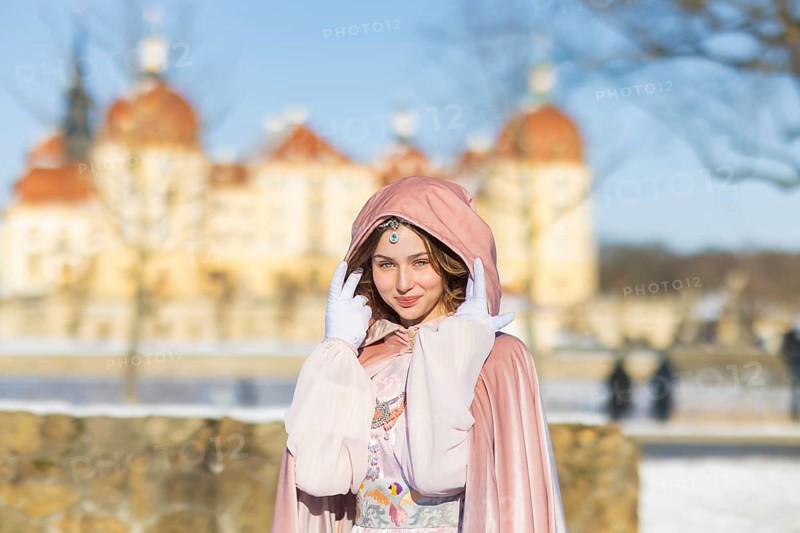 This year, the most popular fairytale film of all time is celebrating a special anniversary. At Moritzburg Castle, one of the film's locations, the exhibition of the cult film Three Hazelnuts for Cinderella opens for the twelfth time - with an anniversary-worthy supporting programme and special exhibition. Model Tamara Kretschmer once again slips into the coveted role of the legendary Cinderella with the ball gown, Moritzburg, Saxony, Germany, Europe