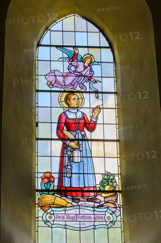 St Notburga, stained glass window, parish church of St Peter and St Paul, Vomp, Inntal, Tyrol, Austria, Europe