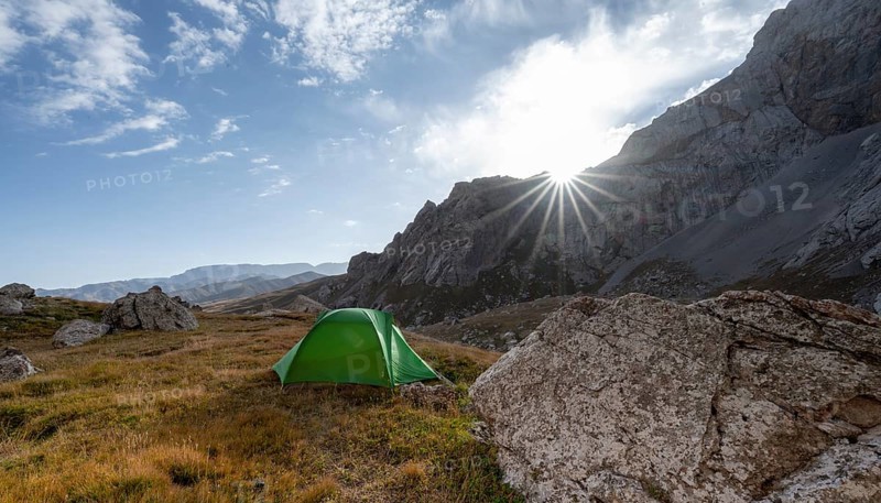 Wild camping, camping in the wilderness with a tent in front of mountain lake Kol Suu, Sary Beles Mountains, Naryn Province, Kyrgyzstan, Asia