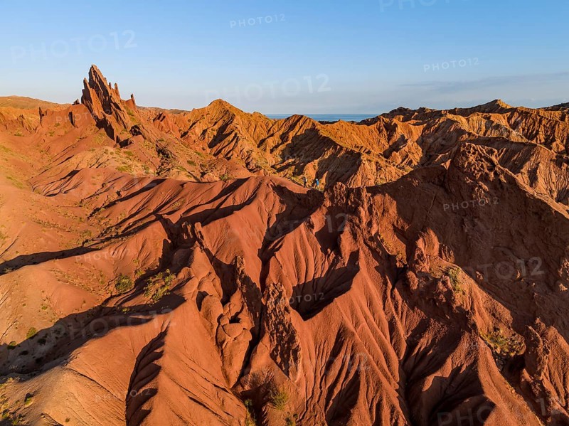 Aerial view, eroded mountain landscape, sandstone cliffs, canyon with red and orange rock formations, Farytale Canyon Skazka, Issyk Kul, Kyrgyzstan, Asia