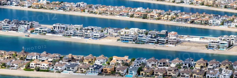 Artificial island in the shape of a palm tree The Palm Jumeirah with luxury villas property panorama in Dubai, United Arab Emirates, Asia