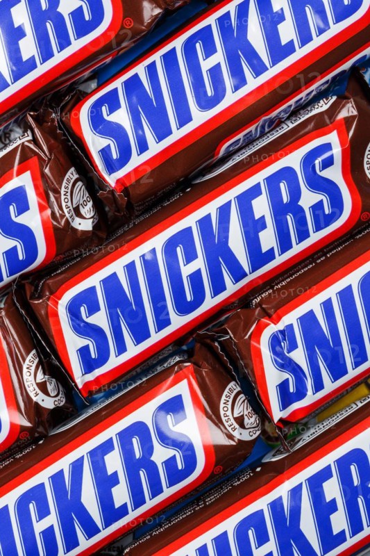 Snickers bar chocolate bar from Mars Inc. as background