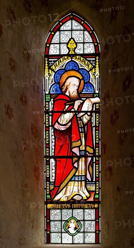 Stained glass window of Saint Matthew by Horwood 1878, church of Saint Mary the Virgin, Silchester, Hampshire, England, UK
